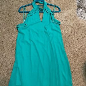 High neck, open back, She + Sky teal dress